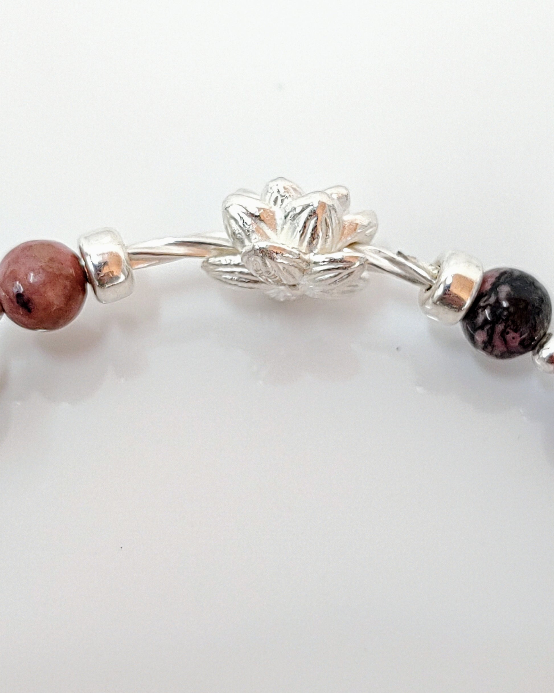 sterling silver bracelet, rhodochrosite jewelry, black veins beads, handmade stretch bracelet, women’s gift jewelry, gift for her, gemstone bracelet, stretchy silver bracelet, unique gemstone gift, natural stone bracelet, birthday gift jewelry, elegant everyday bracelet, handcrafted jewelry
